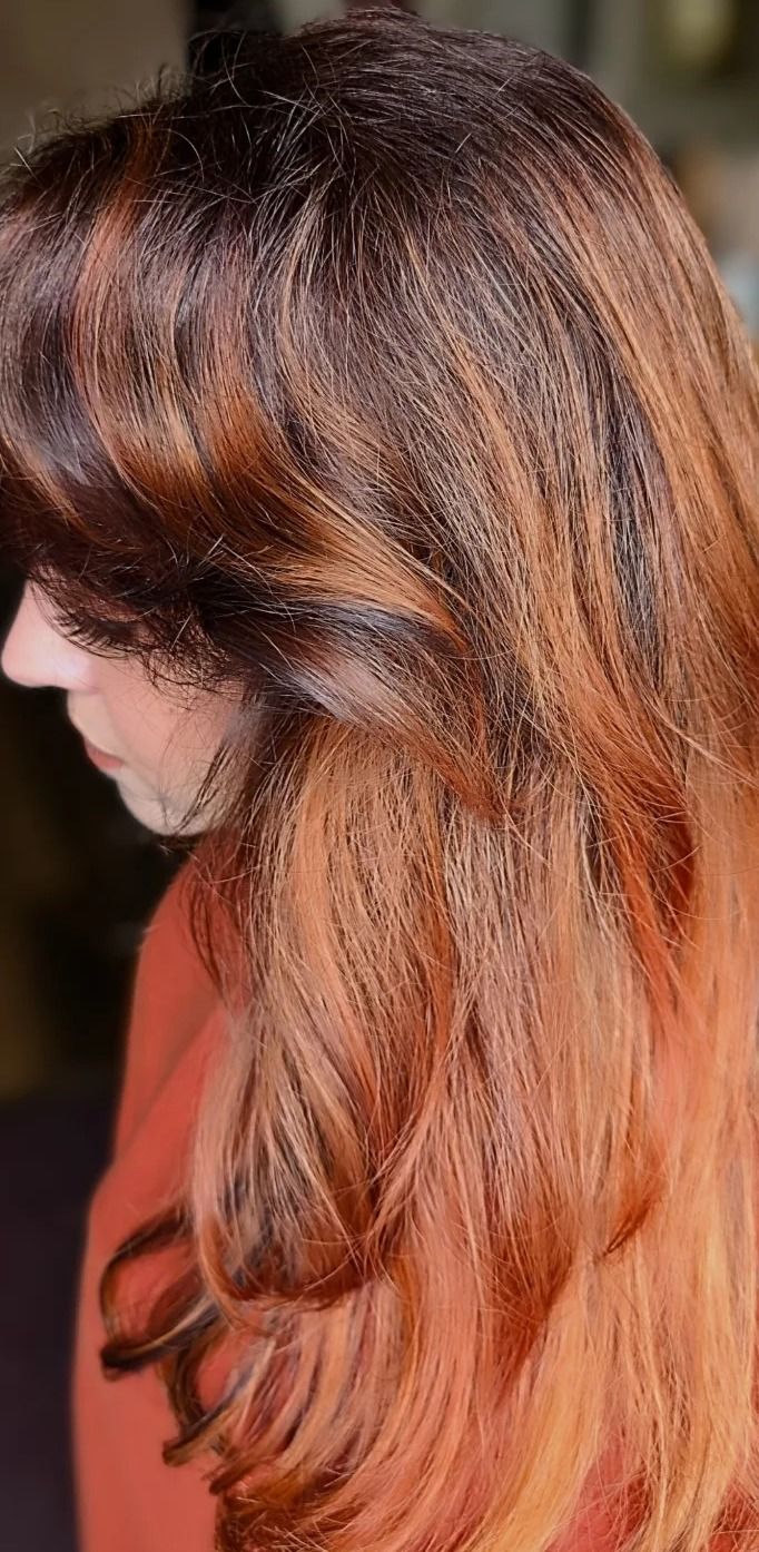 Copper balayage with curtain bangs on a real client