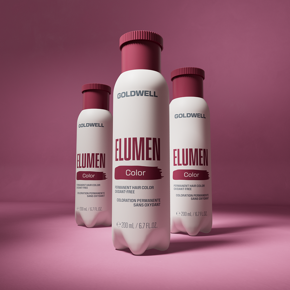 Goldwell Elumen color bottles on a deep pink background, product photo